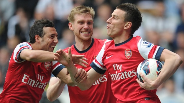Arsenal Laurent Koscielny (right) celebrates scoring the opening goal.