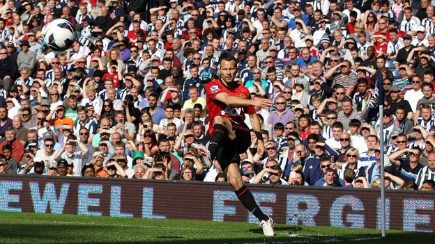 Manchester United's Ryan Giggs takes a corner kick during the game against West Brom.