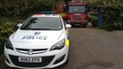 Body found in fire - man arrested