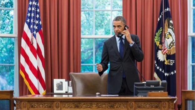 President Obama talks on the phone with Oklahoma Governor Mary Fallin.