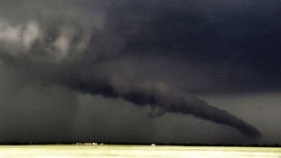 A giant funnel cloud almost makes landfall near South Haven in Kansas