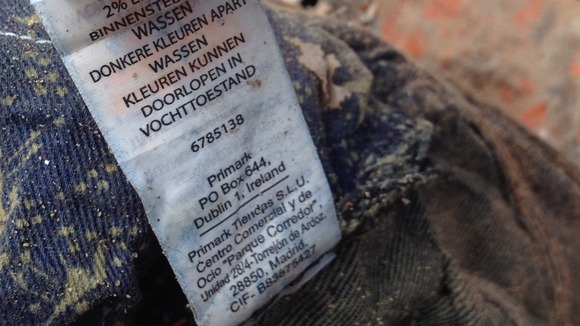 A Primark label is seen in the garments left among the rubble in Savar, Bangladesh