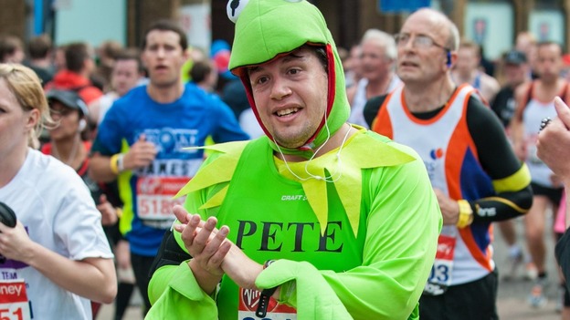 A runner in costume takes part in the 32nd Virgin London Marathon
