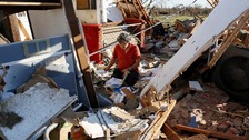 Oklahoma survivors pick through the rubble