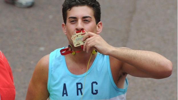Arg from the television programme The Only Way Is Essex (Towie) finishes the 32nd Virgin London Marathon
