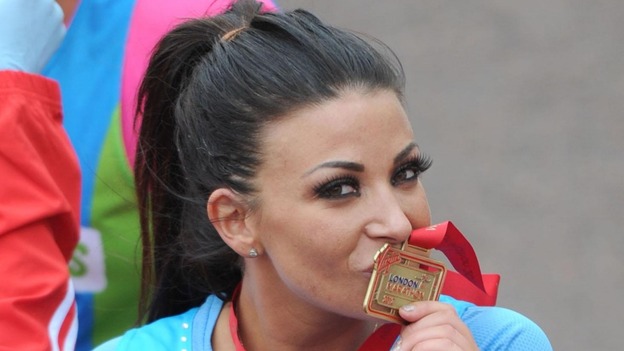 Cara from the television programme The Only Way Is Essex (Towie) finishes the 32nd Virgin London Marathon