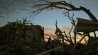 Survivors search flattened homes after deadly tornado