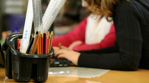 Primary school children at work in a classroom