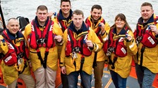 The courage of seven RNLI volunteers is recognised