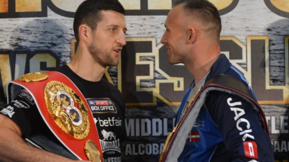 Carl Froch (left) exchanges words with Mikkel Kessler during a press conference at the O2 Arena, London.