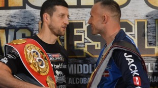 Carl Froch (left) exchanges words with Mikkel Kessler during a press conference at the O2 Arena, London.