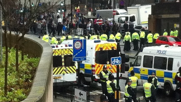 Police keep fans apart after the match