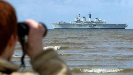 Man watching ship