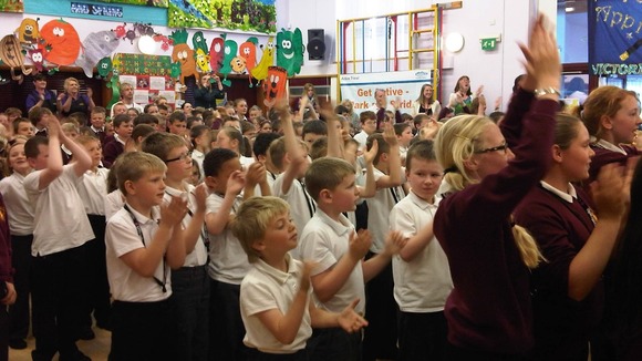 Pupils at Victoria Junior school dance along to District 3.