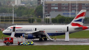 A BA plane surrounded by emergency vehicles after it made an emergency landing at Heathrow airport.
