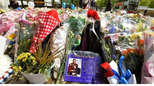Floral tributes outside the main gate of the Royal Artillery Barracks in Woolwich