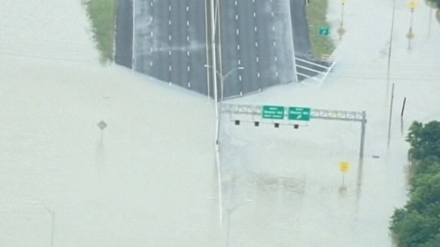 A motorway is part submerged under floodwater