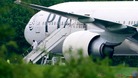Lancashire men charged over plane diversion