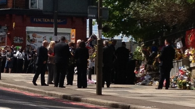 Lee Rigby's relatives pay their respects close to the spot where he was killed