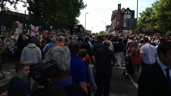 Hundreds pay their respect near the place where Drummer Lee Rigby was killed