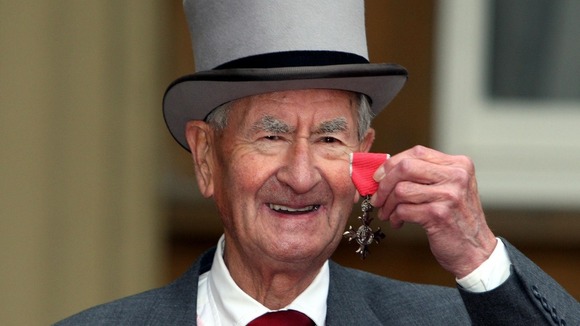 Bill Pertwee outside Buckingham Palace after receiving his MBE
