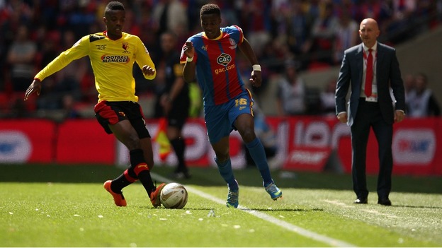 Watford's Nathaniel Chalobah and Crystal Palace's Wilfried Zaha battle for the ball