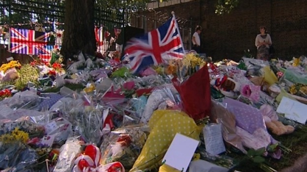 Flowers continue to pile up near to where Drummer Rigby died