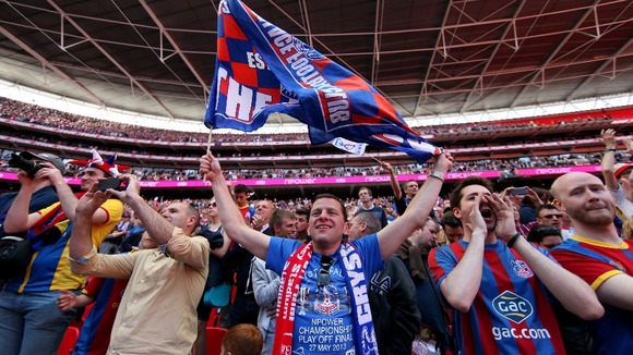 Crystal Palace fans celebrate in the stands