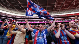 Crystal Palace fans celebrate in the stands