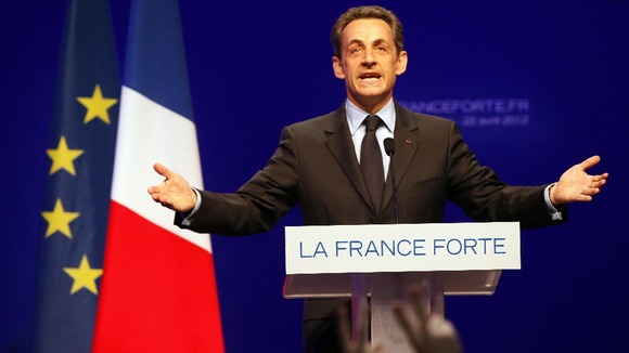 French President and UMP candidate Nicolas Sarkozy speaks at his campaign headquarters
