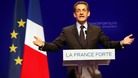 French President and UMP candidate Nicolas Sarkozy speaks at his campaign headquarters