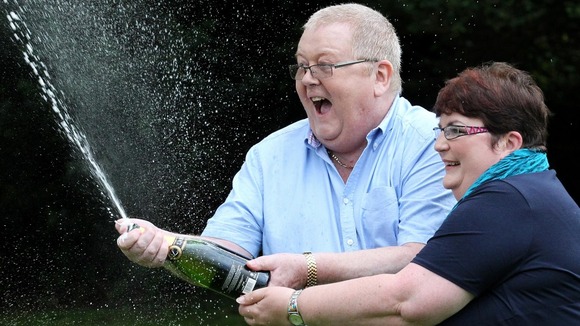 Colin and Chris Weir, from Largs in Ayrshire, celebrate their £161 million win