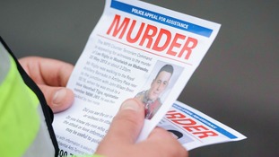Officer with leaflet