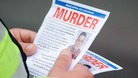 Officer with leaflet