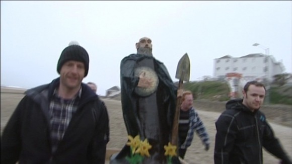 Screen grab of model of St Piran on beach at Perranporth