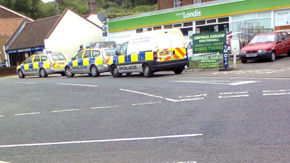Police attend the incident at the Londis store.