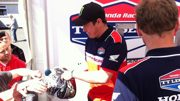 Man signing autograph