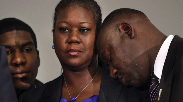 Sybrina Fulton's shoulder, next to Trayvon Martin's brother Jahvaris Fulton,