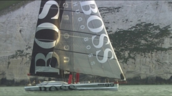 Gosport sailor Alex Thomson and his crew head round the island in a Hugo Boss-sponsored yacht
