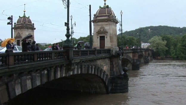 The water in the River Vltava is almost at the level of the city's bridges