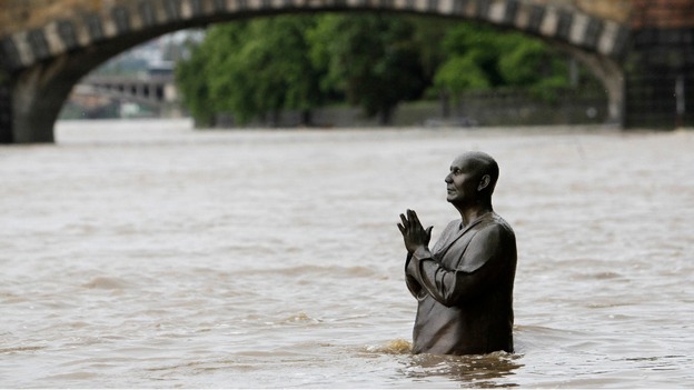 The statue of world harmony leader Sri Chinmoy has become part of the Vltava river in Prague
