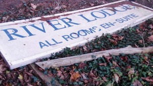 River Lodge sign