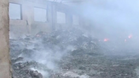 The remains of the plant were still being dampened down.