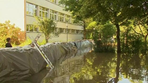Sandbags protect a school from the rising water