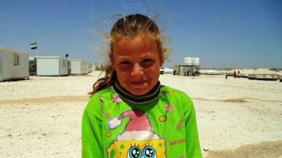 Rawan, 8 , fled from her village in southern Syria after it was shelled by government forces.