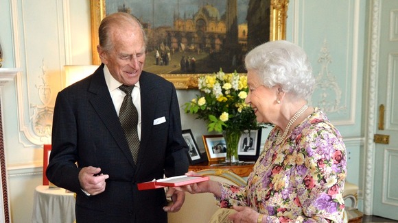 The Duke of Edinburgh smiled as he received the the Order of New Zealand from the Queen yesterday.