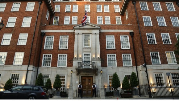 Police officers pictured outside the London Clinic, where Prince Philip is undergoing an exploratory operation.