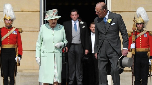 The Queen and Prince Philip attended a garden party at Buckingham Palace yesterday.