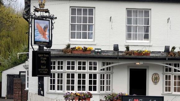 Greene King old pub sign for the Spread Eagle