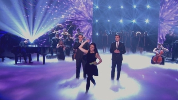 Natalie Holt, 30, rushed to the front of the stage and threw eggs at Simon Cowell during Richard and Adam's performance.